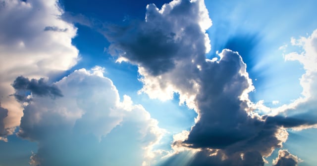 Clouds in the sky with the sun shining through